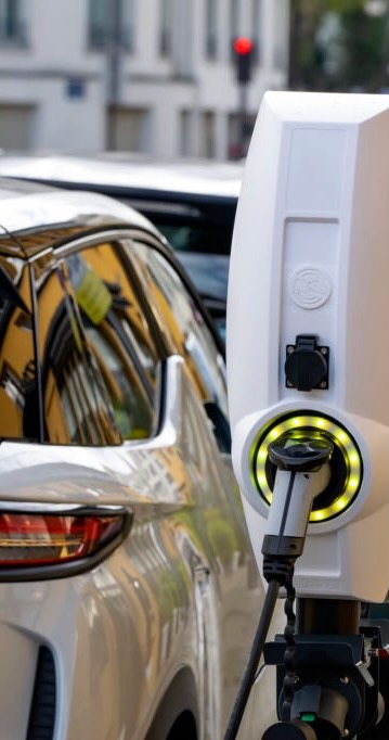 Paris, France - 13 November, 2019: Public charging points in a row on the street. The charging points are a popular view in European cities.